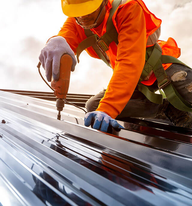 installation of commercial metal roofing panel